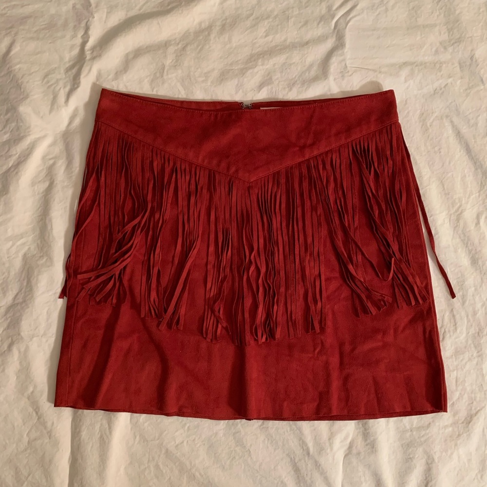 Burnt orange fringe mini skirt